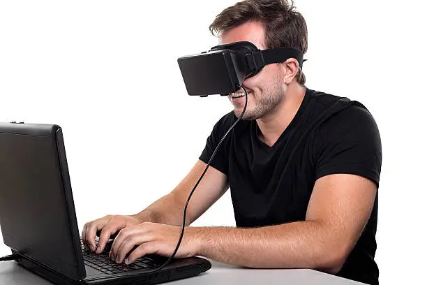 Photo of VR Gamer Tethered to a Computer