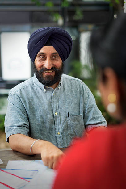 istock Indian Couple Planning Trip Concept 617736274