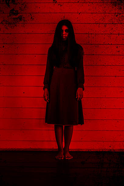 istock Girl standing in front of the wall 617737722