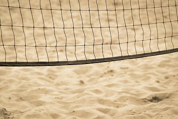 istock grid of beach volleyball closeup 617737738
