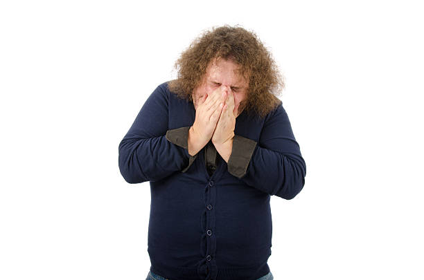 istock Winter, cold. Man and runny nose. 617738948