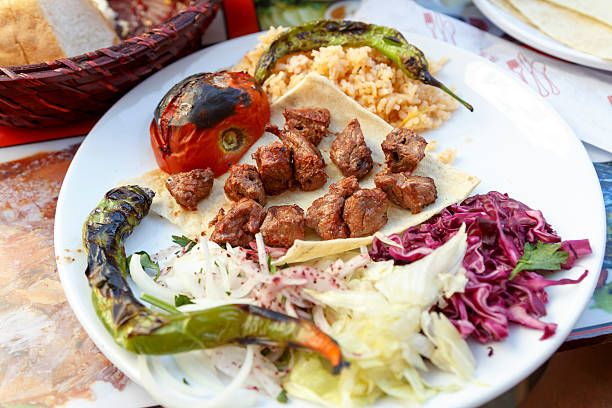 istock Mixed grilled meat platter and vegetable. 617740356