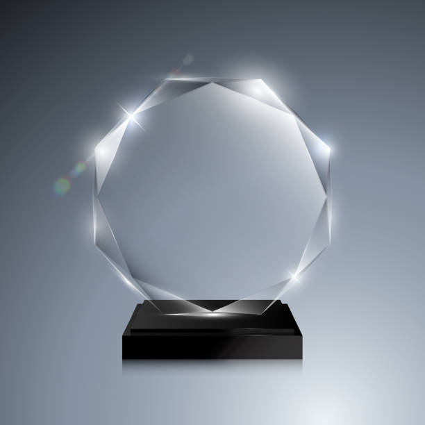 Glass trophy award. Vector crystal 3D mockup Glass trophy award. Vector crystal 3D transparent award mockup with pedestal on gray background. Glass acrylic prize octagonal model for engraving crystal glassware stock illustrations