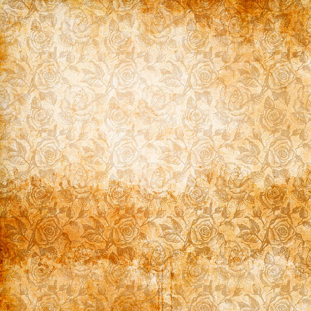 istock Old stained paper background with floral patterns. 617741856