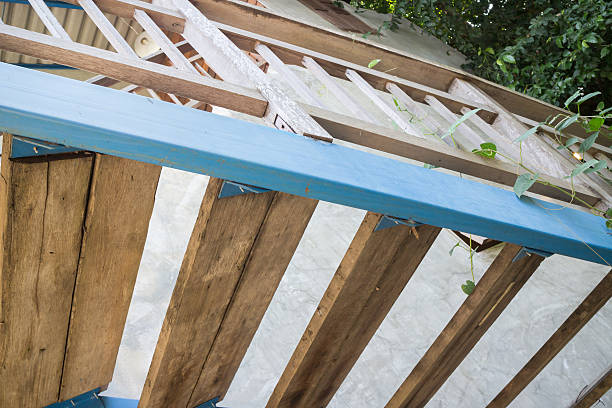 istock Minimal house side with wooden up stair 617742256