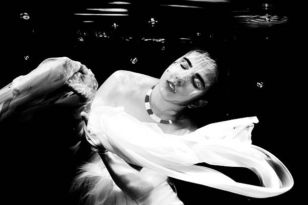 istock Underwater black and white fashionable photography, beautiful yo 617744708