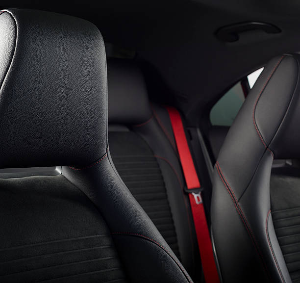 istock Leather car seats  detail with focus on stitch 617745554