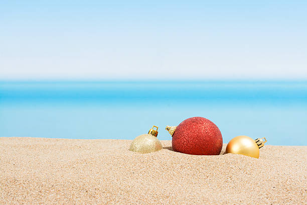 Christmas tree decorations on the beach in tropical. Concept of new year holiday in hot countries