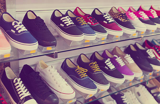 istock Shelves with casual shoes 617746512
