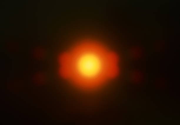 istock blurring candle light reflect on television screen in the dark 617747298