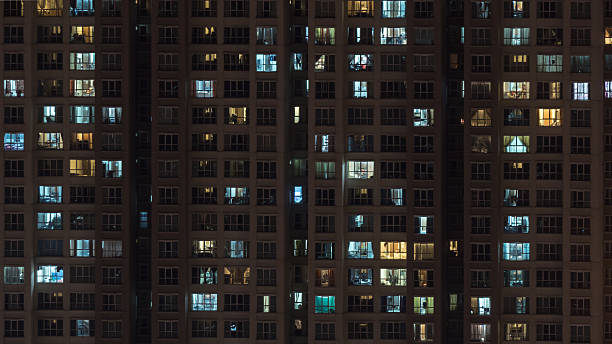 istock High-rise apartment block at night 617750090