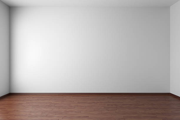 istock Empty white room with dark parquet floor 617750702