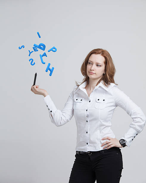 istock Woman working with a set of letters, writing concept. 617751476