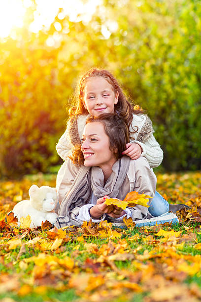 istock Mother and daughter in nature 617753936