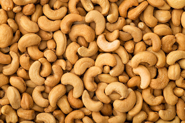 Cashews Cashews background cashew photos stock pictures, royalty-free photos & images