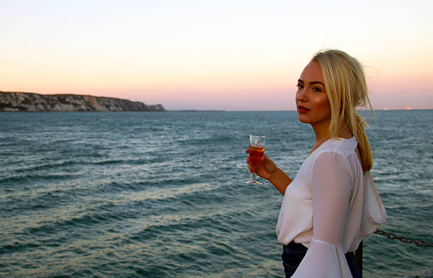 Classy English lady drinking Champagne