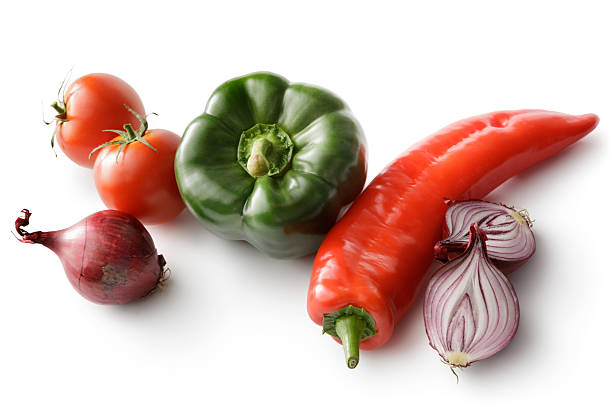 eggplant,tomatoes,peppers and a mobile phone.isolated on a white background.
