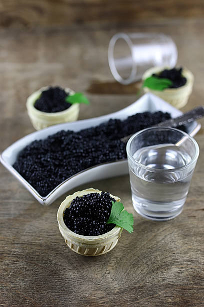 istock black caviar on a wooden background 617758042