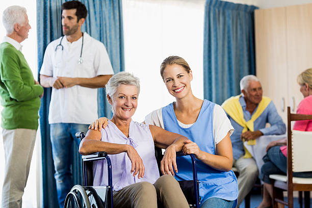 istock Nurses taking care of seniors 617758332