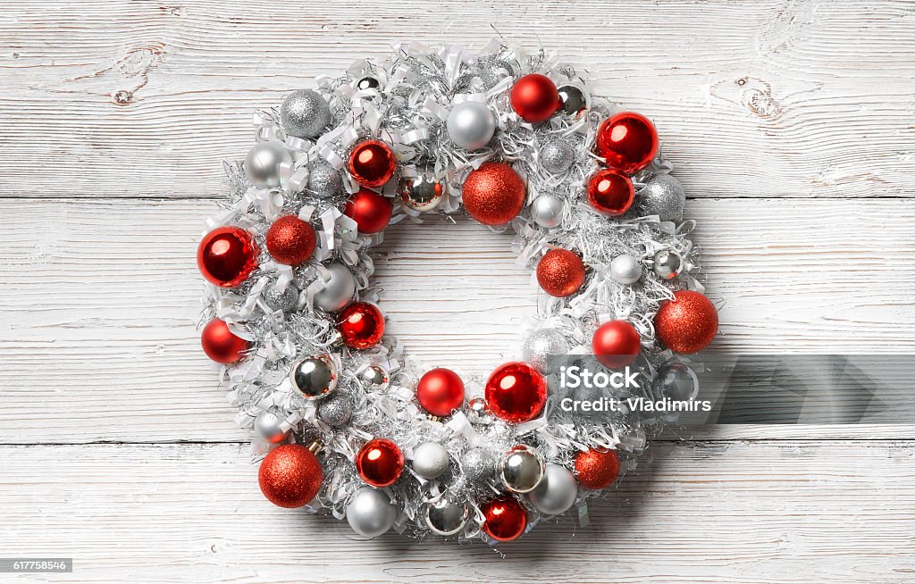 Christmas Wreath Wood Background, Hanging Holiday Decoration Balls, Wooden Wall Christmas Wreath Wood Background, Hanging Holiday Decoration Balls on White Wooden Planks Wall Wreath Stock Photo