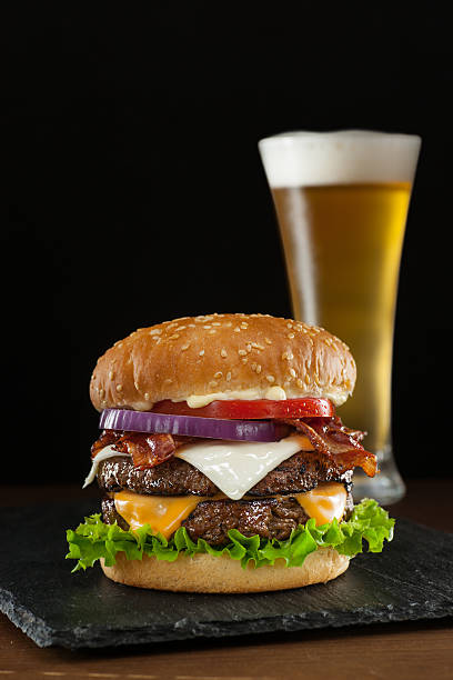 steakhouse double bacon cheeseburger - sesame bun american culture cheddar imagens e fotografias de stock