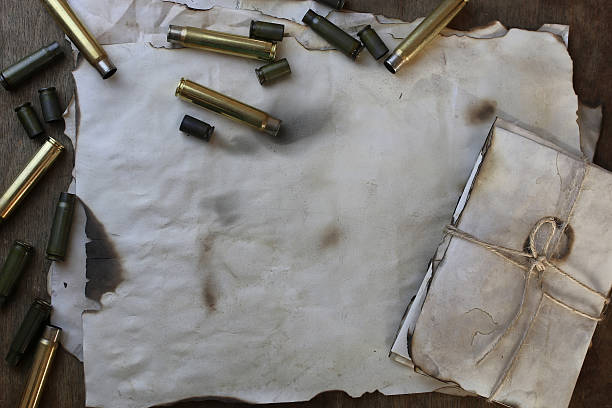 istock bullet and retro paper on the table 617760462