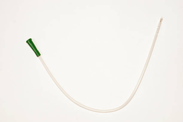 Urinary catheter an intermittent transparent catheter isolated over a white backgroundUrinary catheter catheter photos stock pictures, royalty-free photos & images