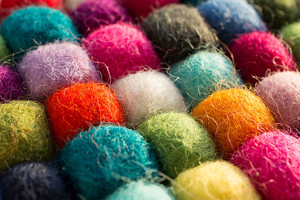 istock Geometric background with balls of colored synthetic wool 617764866