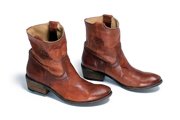 istock Pair of brown leather cowboy boots 617768082