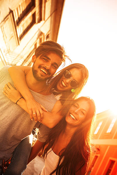 istock Group of happy young friends having fun 617768526