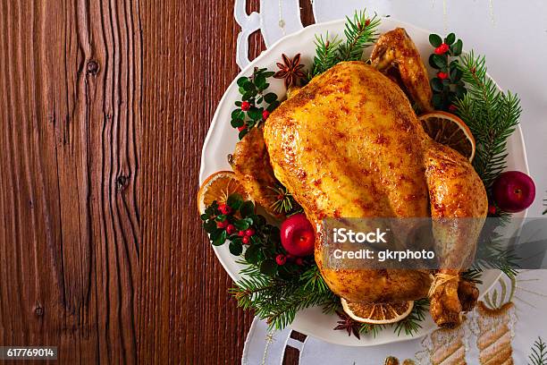 Roasted Whole Chicken With Christmas Decoration Stock Photo - Download Image Now - Christmas, Turkey Meat, Food