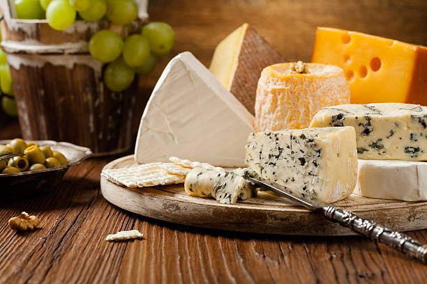 istock Mix cheese on wooden board. 617771300