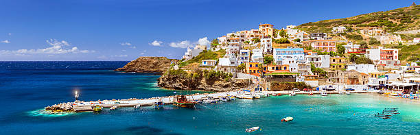 istock Crete, Harbour with boats and lighthouse in Bali 617772626
