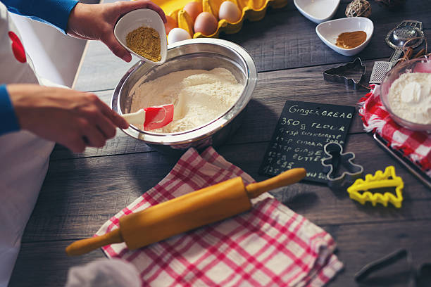 istock Woman make ginger bread for Christmas 617774018