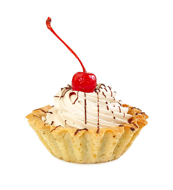 istock Cake basket with cream and maraschino cherry 617774354