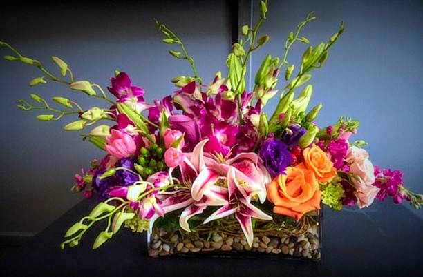 istock Square vase with colorful flowers 617775520