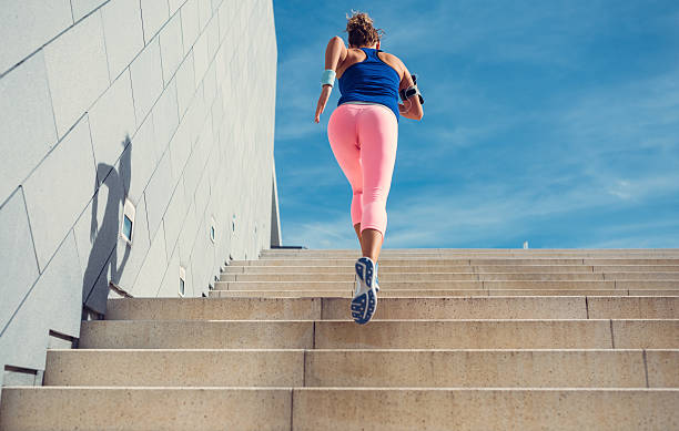 istock Sports woman jogging 617775722