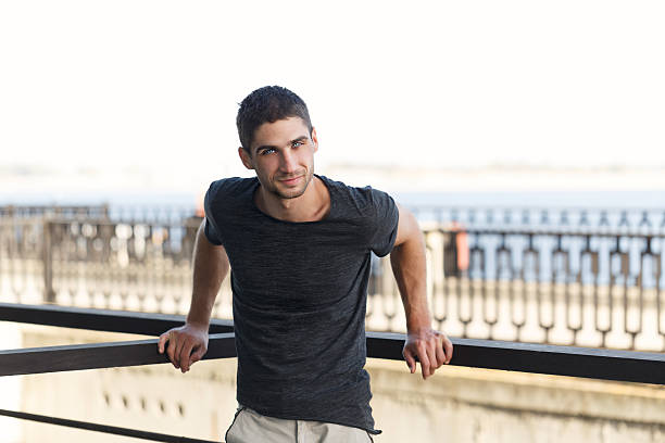istock Man in a dark T-shirt. 617776336