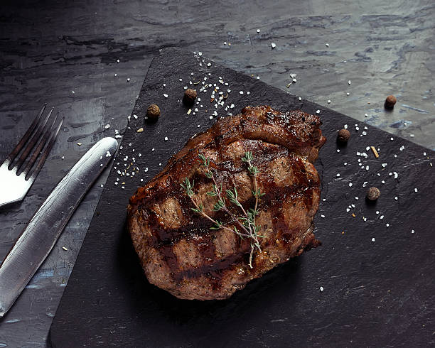 istock Closeup of medium rare roast beef steak 617777080