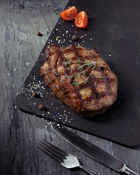 istock Closeup of medium rare roast beef steak 617777176