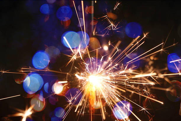 istock sparkler on gold bokeh background macro close up 617777238