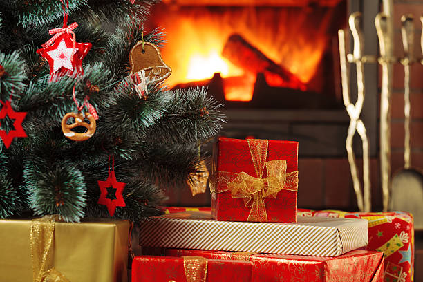 istock Christmas presents under the Christmas tree on the background of 617777436