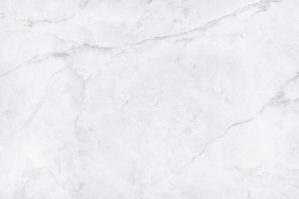istock White marble texture in natural patterned for background and design. 617777476