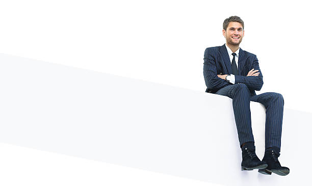 istock young business man sitting on a white top 617778124