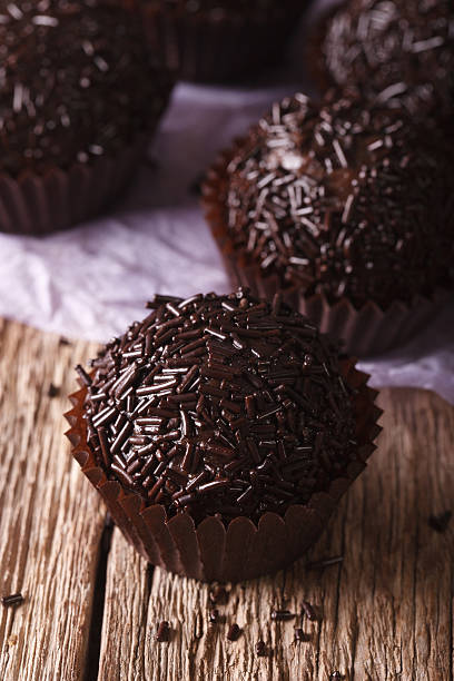 istock Chocolate Truffle Bonbon macro on the table. Vertical 617779492