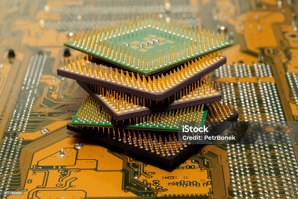 Stack of CPU processors and Circuit board / Motherboard. Stack of CPU processor and Circuit board / Motherboard. Electronic computer hardware technology. Motherboard digital chip. Tech science. Information engineering component. Built Structure Stock Photo