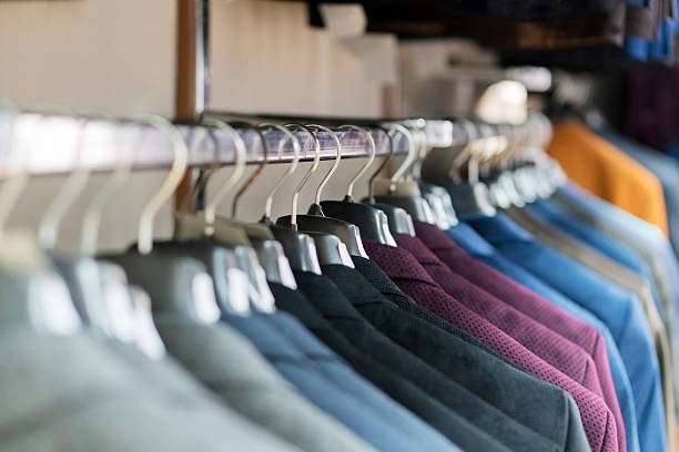 istock Clothing for man in a clothing store 617865130