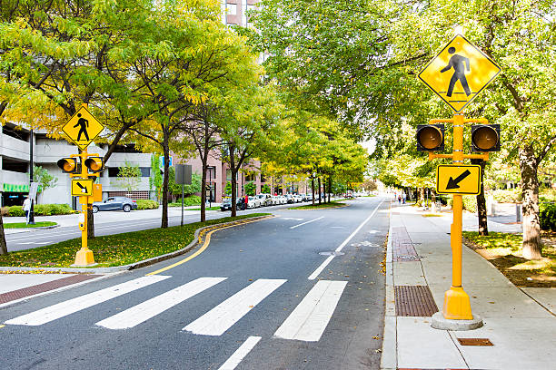 pedestrian crossing in the city traffic sign and traffic lights on zebra crossing crosswalk stock pictures, royalty-free photos & images