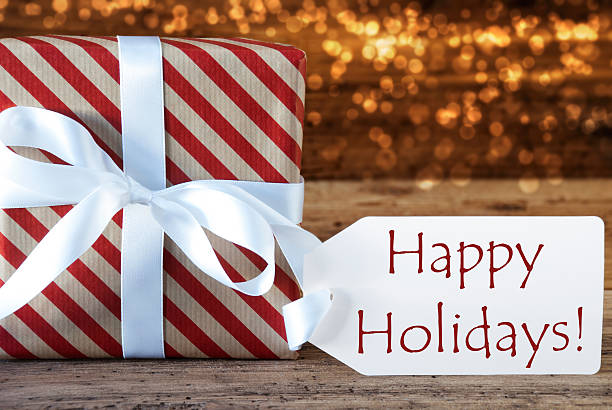 istock Atmospheric Christmas Gift With Label, Happy Holidays 617870590