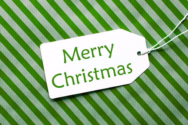 istock Label On Green Wrapping Paper, Text Merry Christmas 617871270